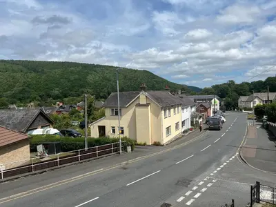 a street in a small town with a house at Twyngaer, a spacious 3 bedroom bungalow sleeps 5 in Knighton