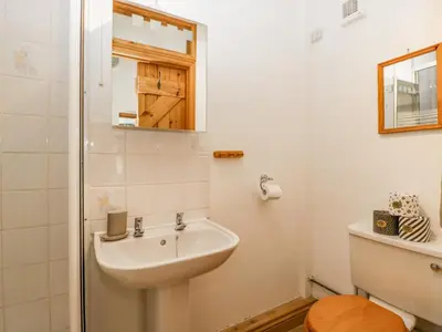 a bathroom with a sink and a toilet at Fieldfare in Leominster