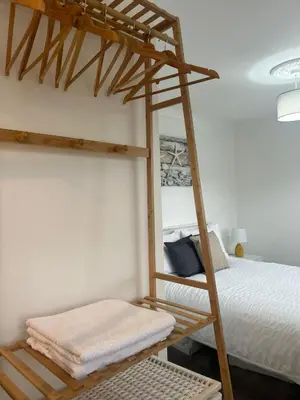 a bedroom with a bunk bed and a bunk bed at BROOK HOUSE 4a in Llangollen