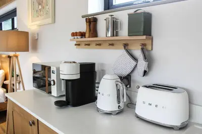 a kitchen with two appliances on a counter at The Tin Shed in Rhayader