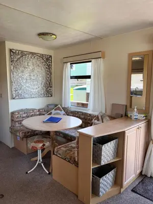 a living room with a couch and a table at welcome to B4 in Aberystwyth