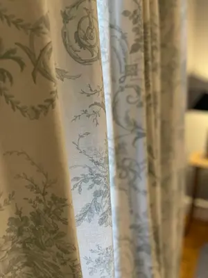 a curtain with a floral design on a wall at River walk . Shrewsbury.Shropshire.With parking. in Shrewsbury