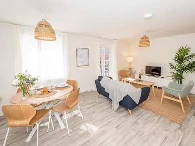 a living room with a table and chairs at Brand new 1 bedroom modern contemporary apartment - Pass the Keys in Ludlow