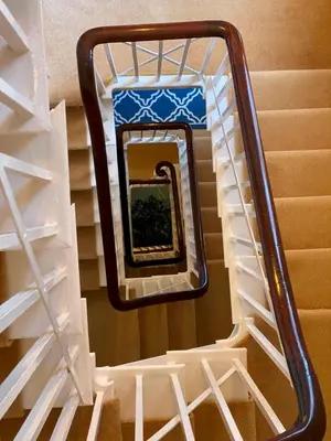 a mirror on a ladder in a room at Superbly Located Handsome Georgian Townhouse - Pass the Keys in Shrewsbury