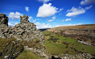 an old stone building on the side of a mountain at 2 Bed in Corwen oc-waf161 in Carrog